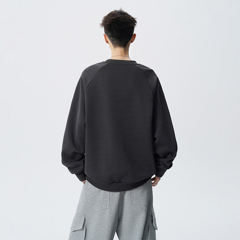 Sudadera de cuello redondo y manga larga de corte holgado para hombre