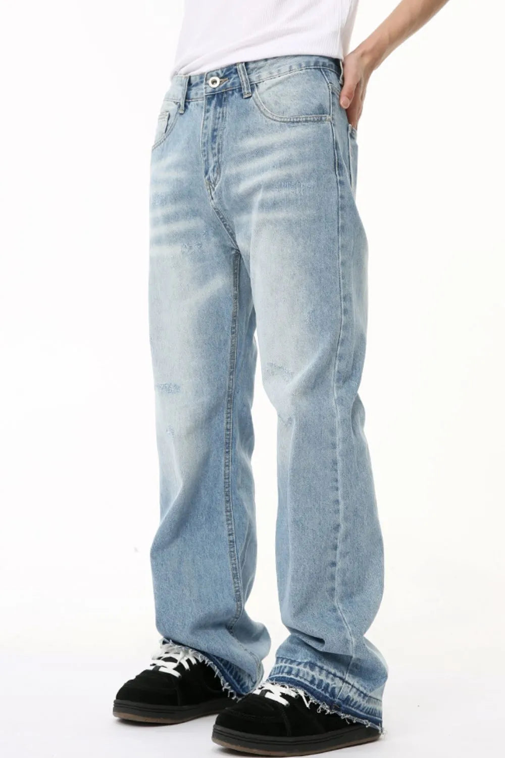 Image of Jeans holgados con bolsillos en tono medio