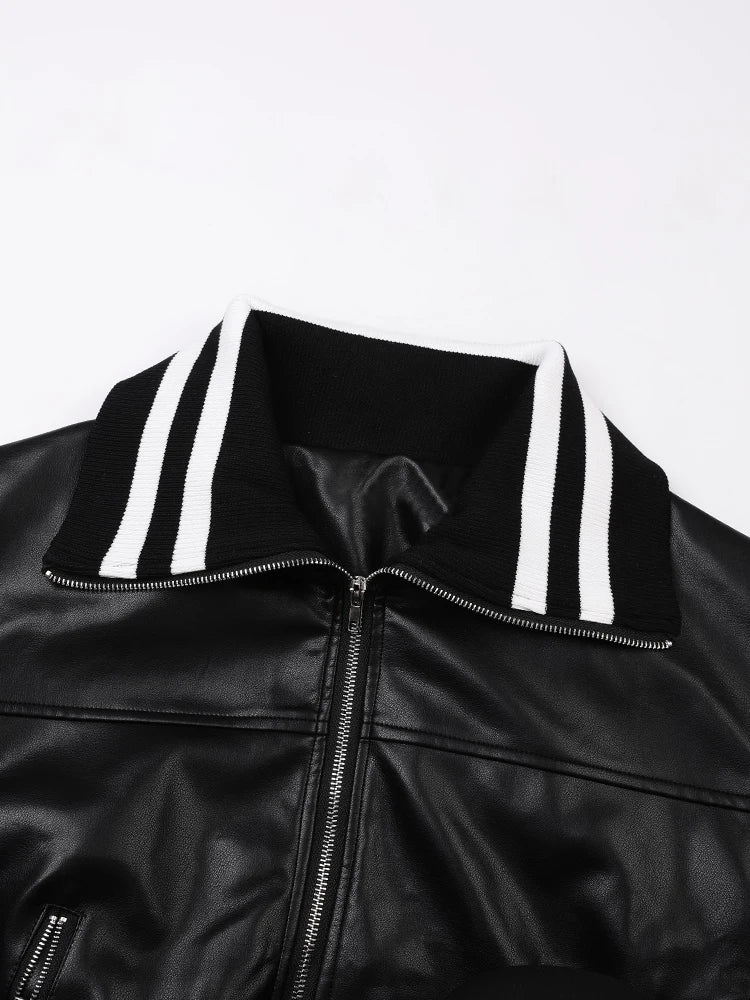 Image of Women's black striped faux leather jacket