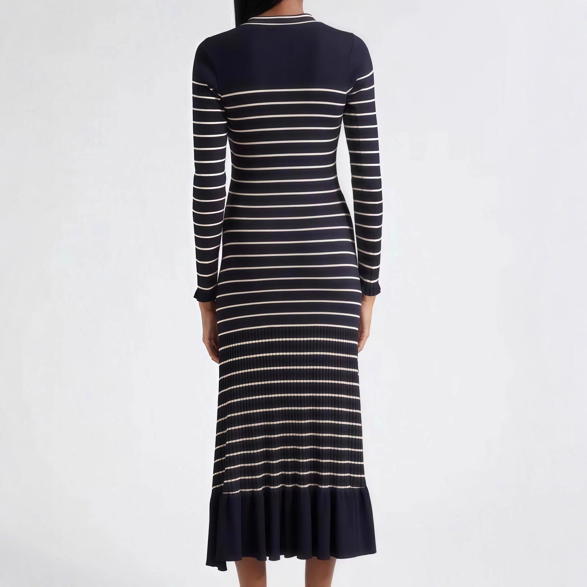 Image of Vestido largo de punto con cuello en V y rayas para mujer