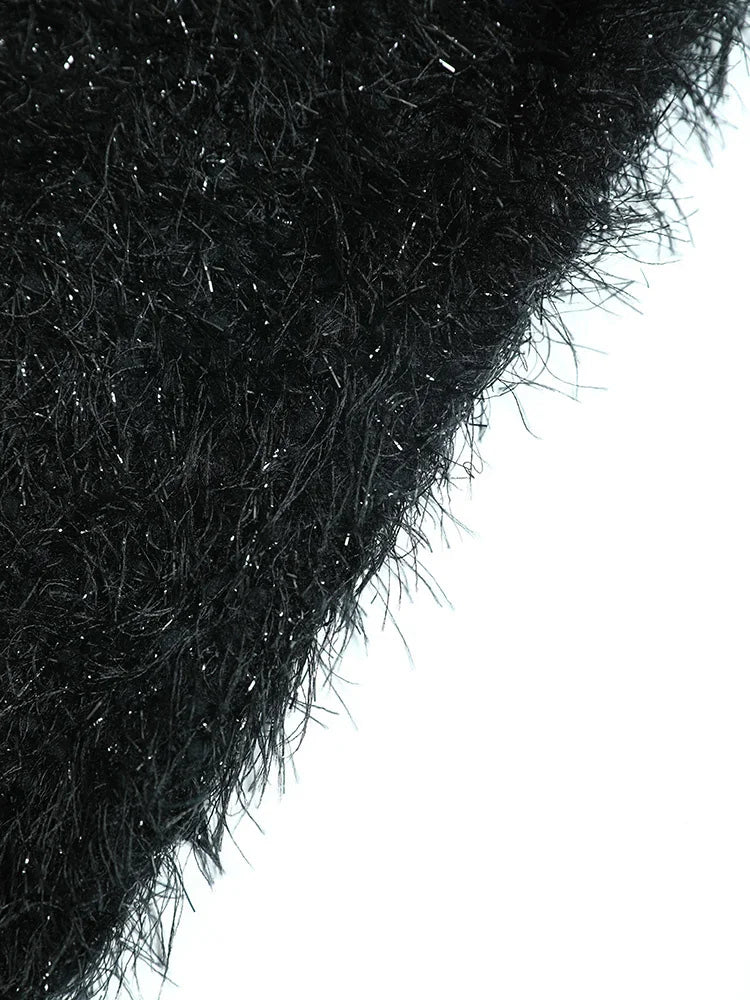 Image of Women's black oversized turtleneck knit sweater