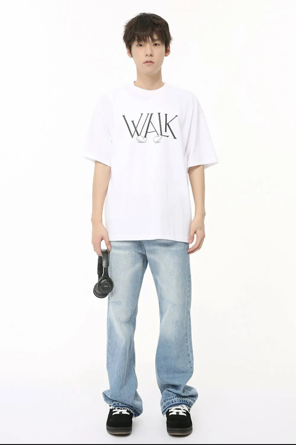 Image of Jeans holgados con bolsillos en tono medio