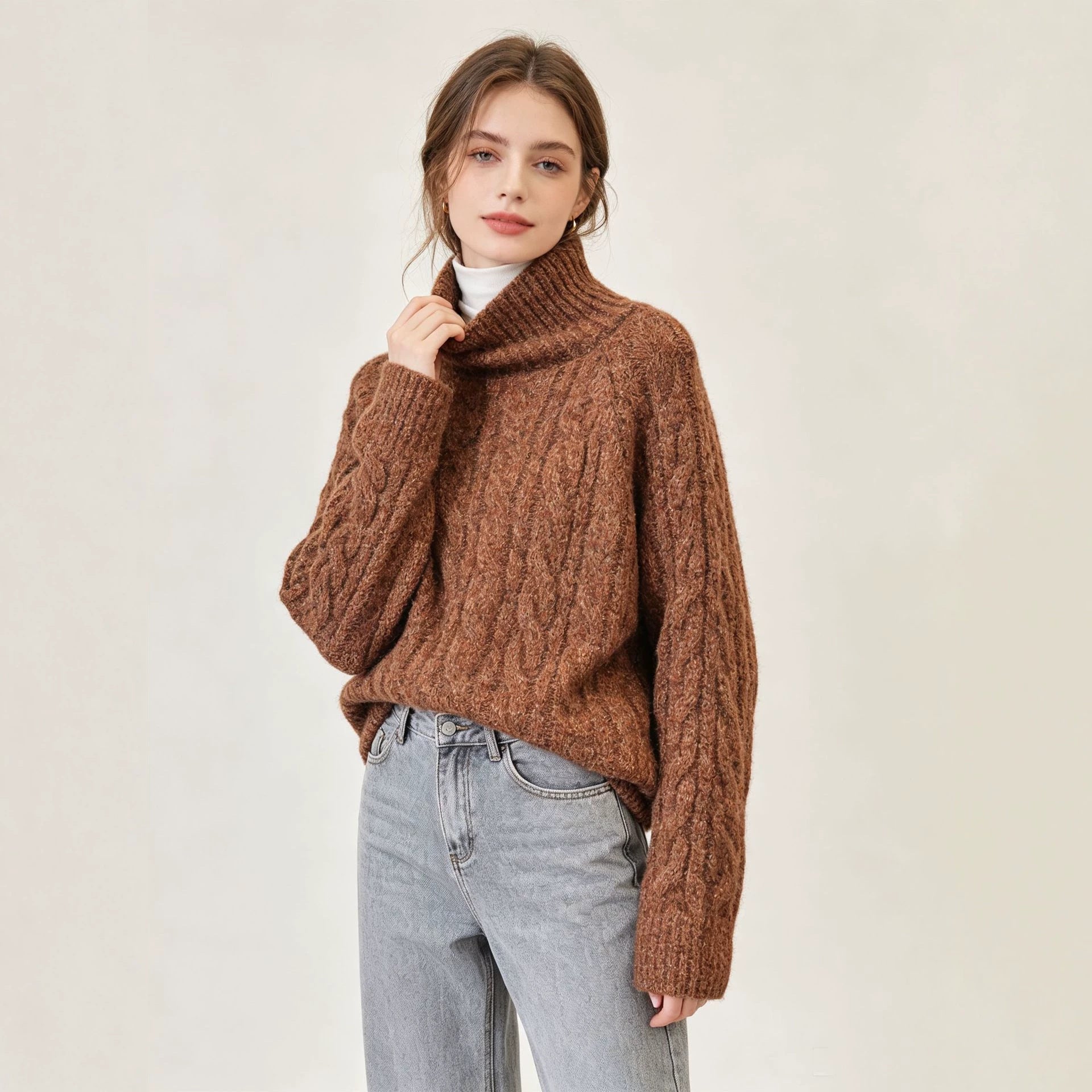 Image of Suéter de punto con cuello alto y corte relajado para mujer