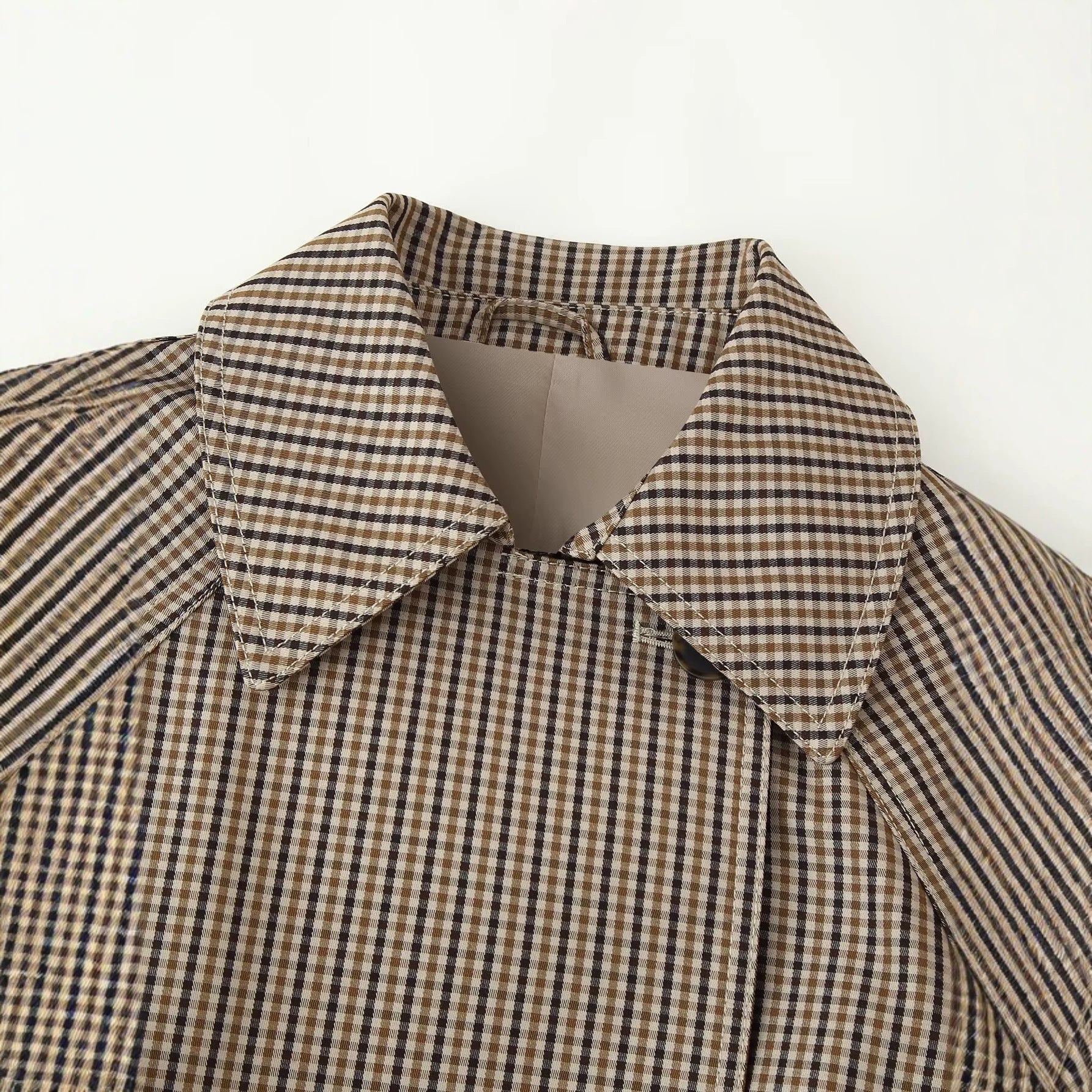 Image of Women's belted brown plaid double-breasted trench coat