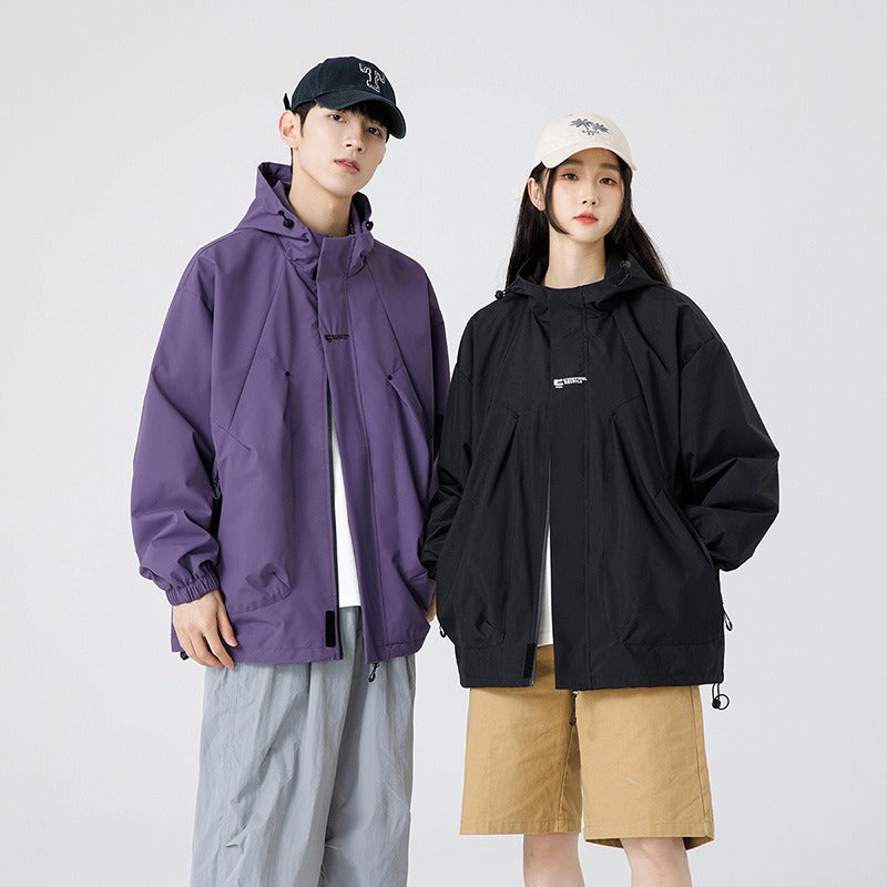 Image of Chaqueta utilitaria de trabajo con cierre y diseño colorblock unisex
