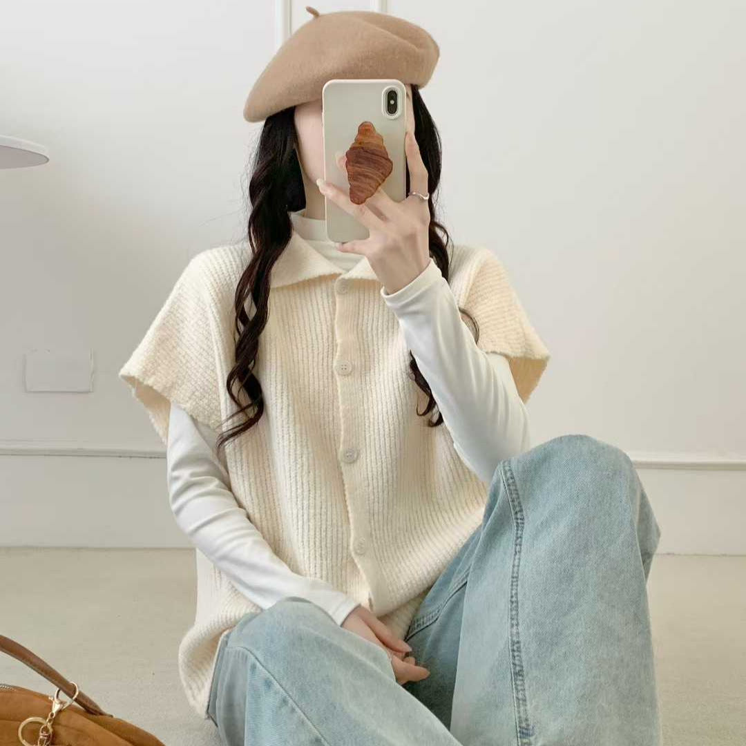 Image of Sleeveless turtleneck knit vest with button front