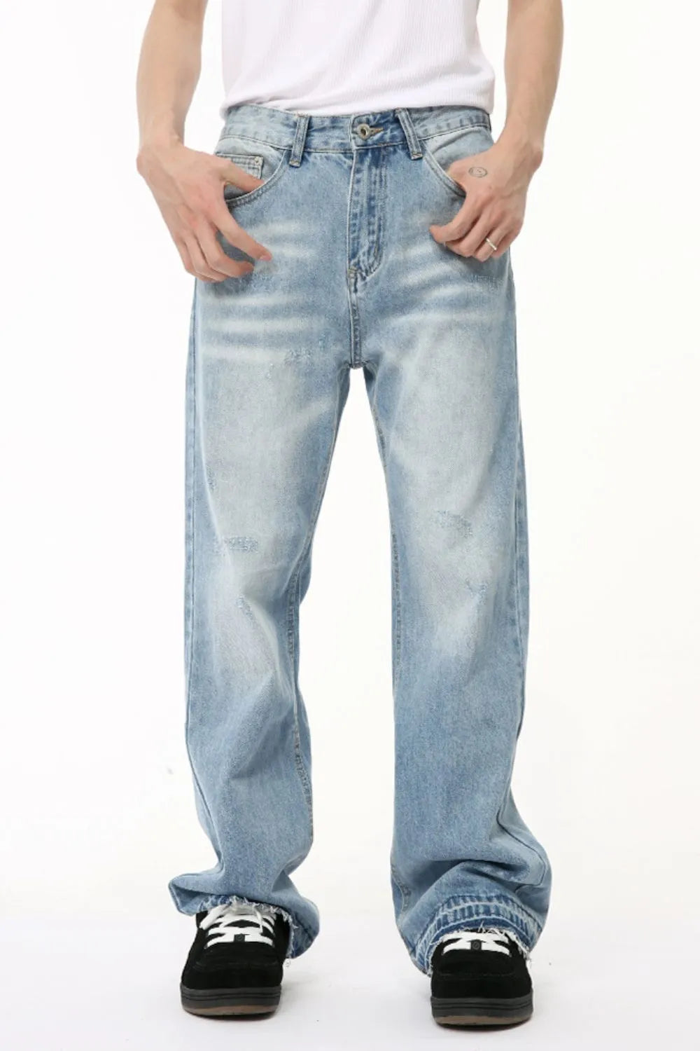 Image of Jeans holgados con bolsillos en tono medio