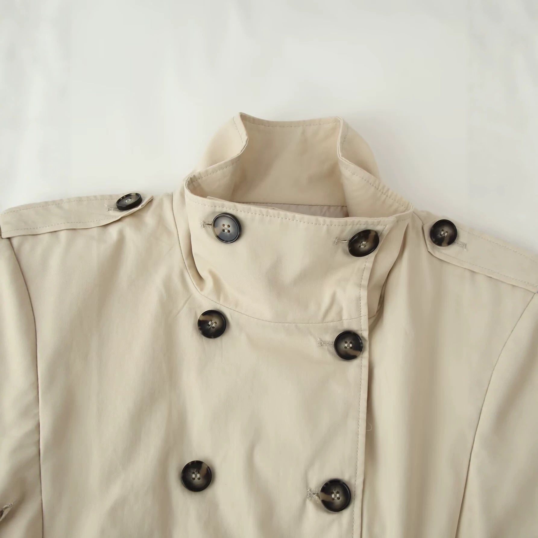 Image of Women's beige pleated stand collar trench coat