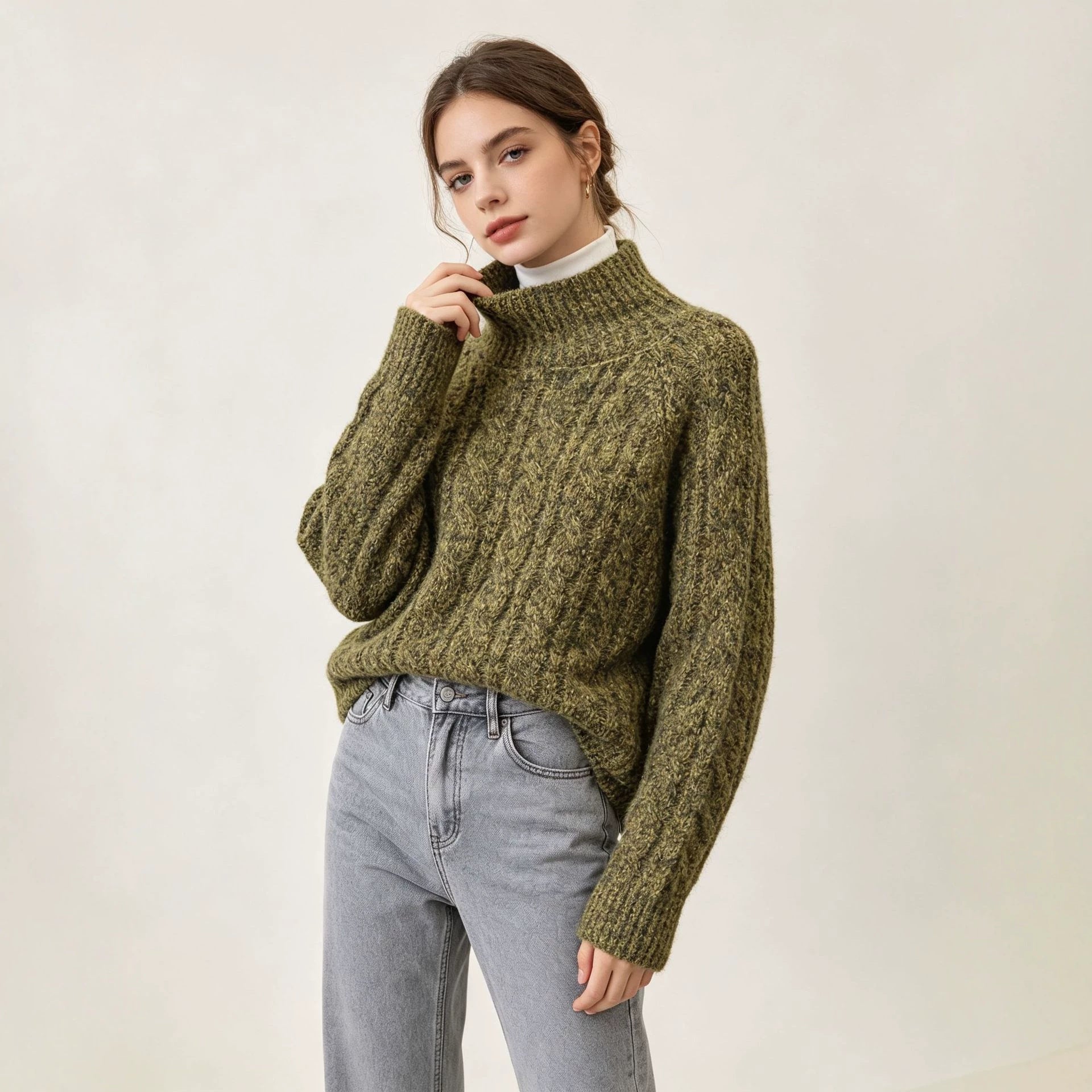 Image of Suéter de punto con cuello alto y corte relajado para mujer