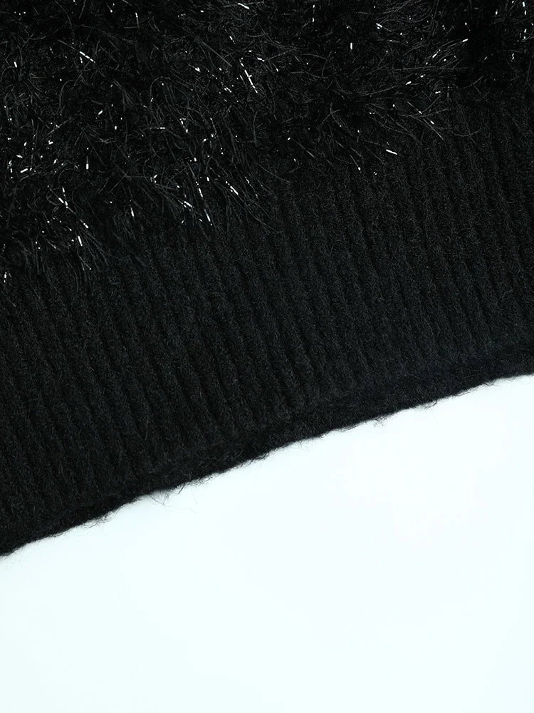 Image of Women's black oversized turtleneck knit sweater
