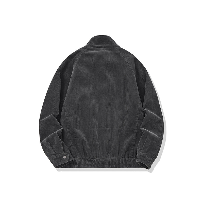 Image of Chaqueta de pana tipo patchwork con cuello alzado y cremallera