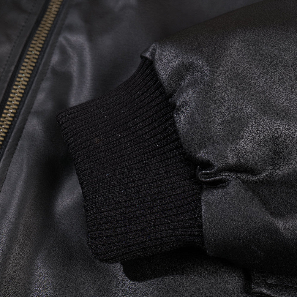 Image of Chaqueta de piel sintética negra con cremallera y cuello de pelo
