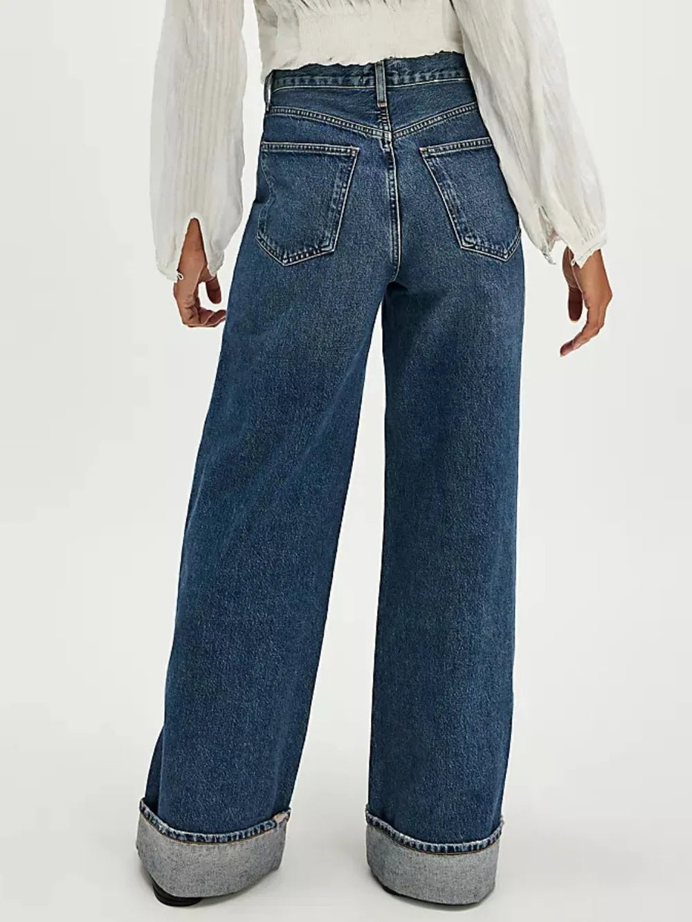 Jeans con dobladillo en el bolsillo