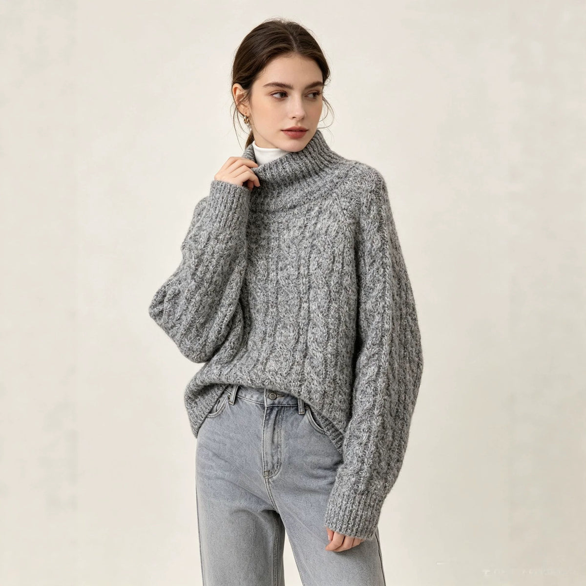 Suéter de punto con cuello alto y corte relajado para mujer