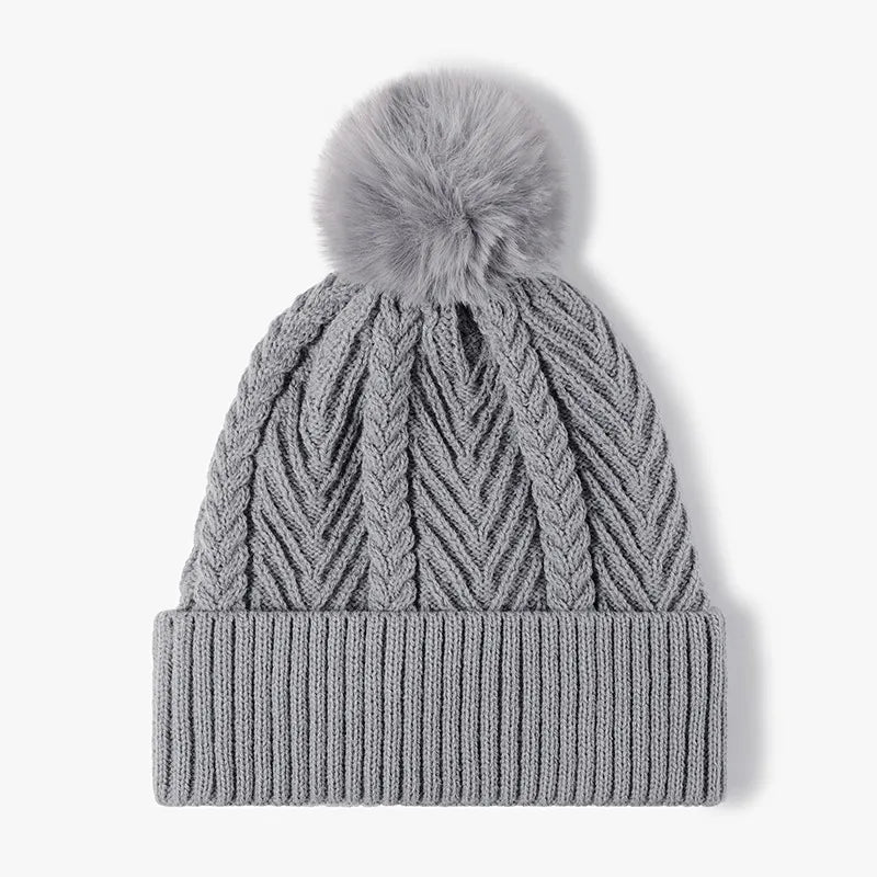 Acrylic cable knit pom-pom beanie