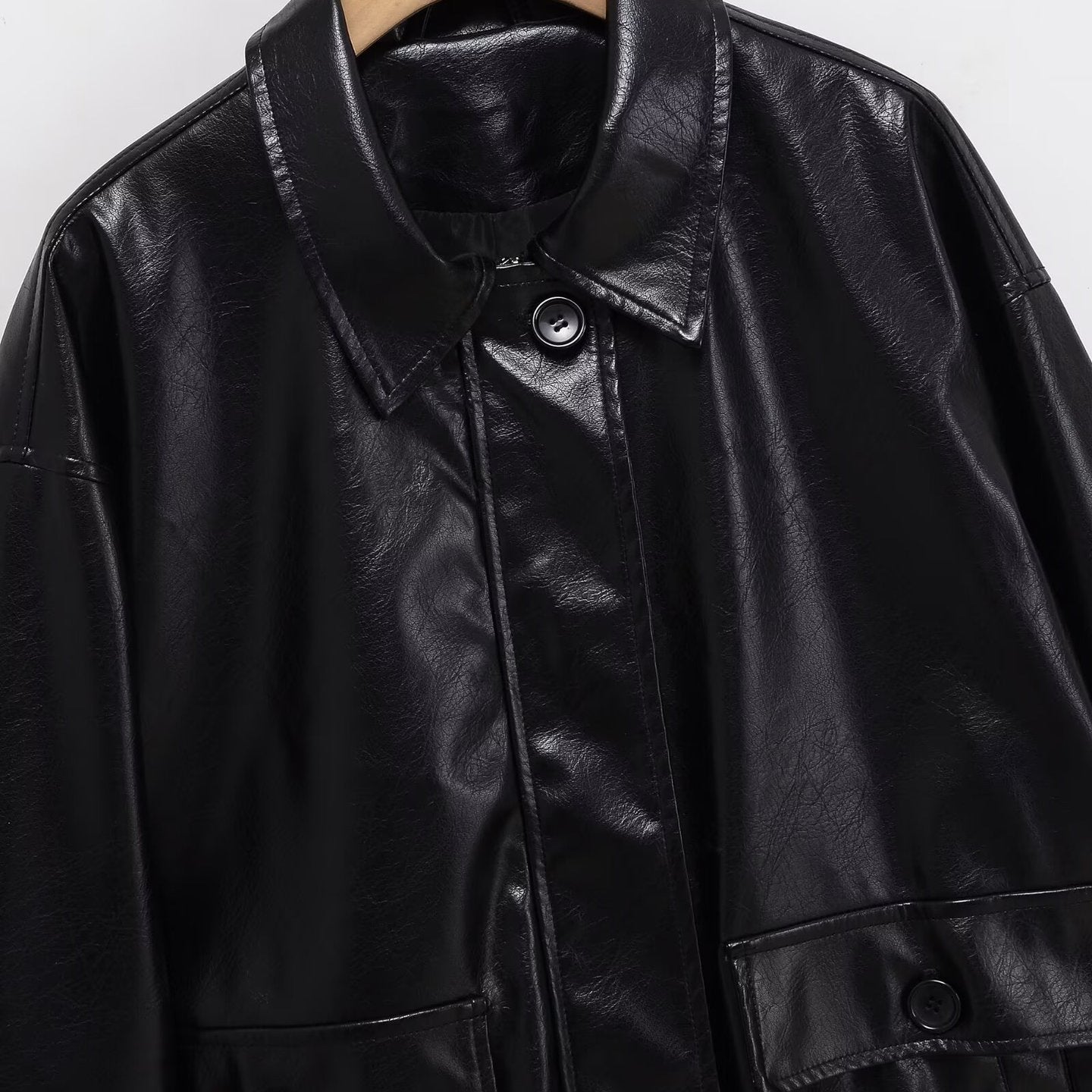 Image of Women's loose fit black faux leather biker jacket