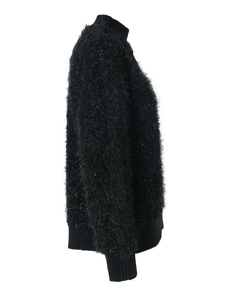 Image of Women's black oversized turtleneck knit sweater