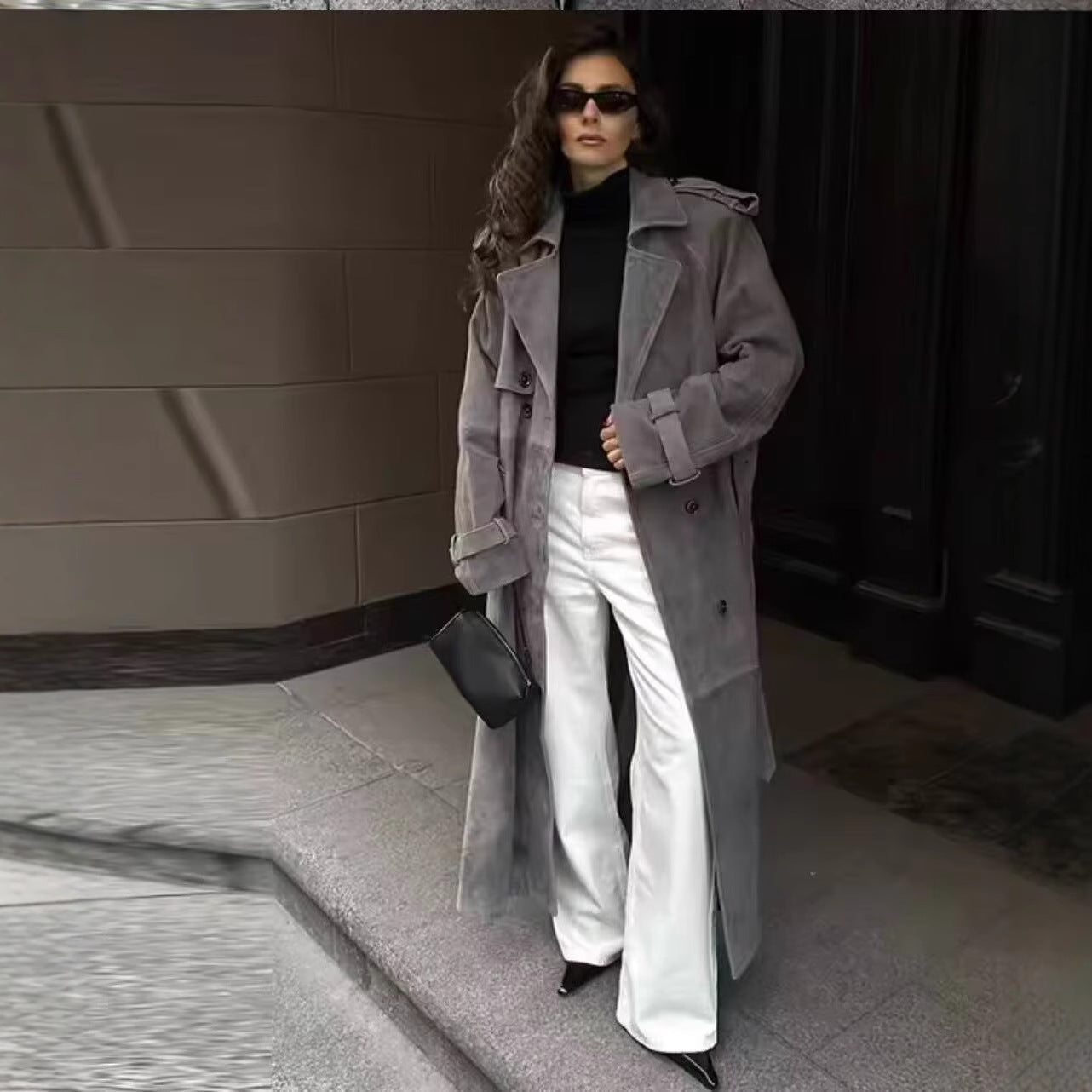 Image of Women's loose fit double-breasted belted trench coat
