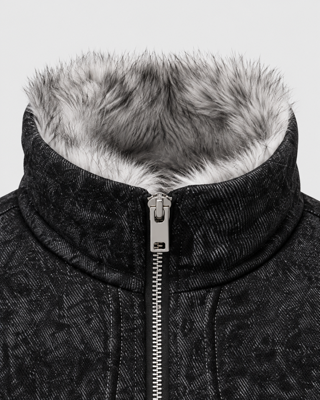 Image of Black | Close-up of the collar detail on the black zip-up jacket