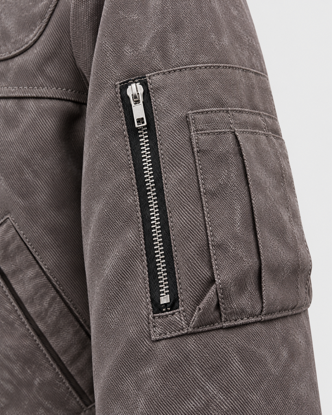 Image of Light coffee color | Close-up of the sleeve zip detail on the light coffee color zip-up jacket