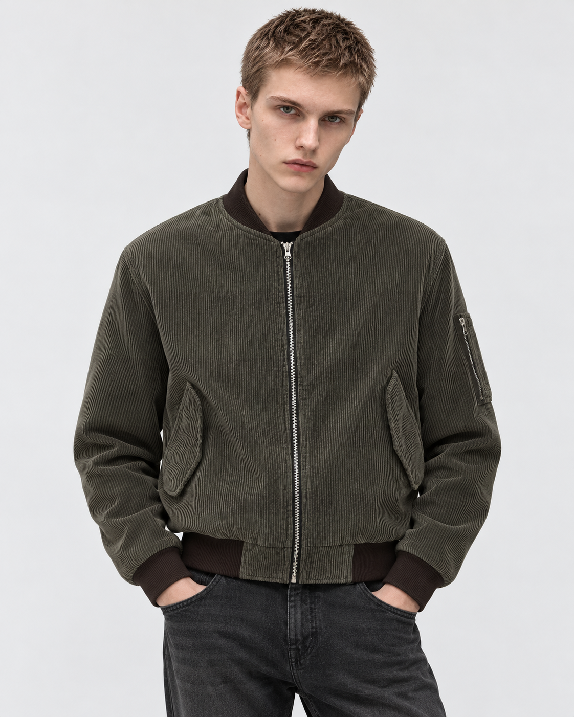 Dark Brown | Male model wearing the dark brown zip-up jacket, studio pose