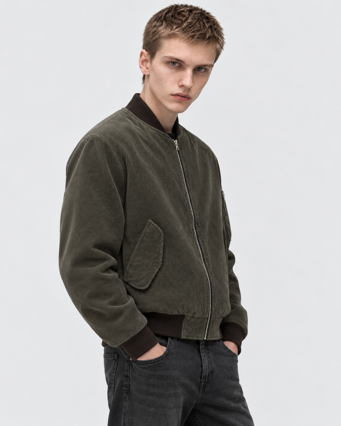 Image of Dark Brown | Male model wearing the dark brown zip-up jacket in an alternate studio pose