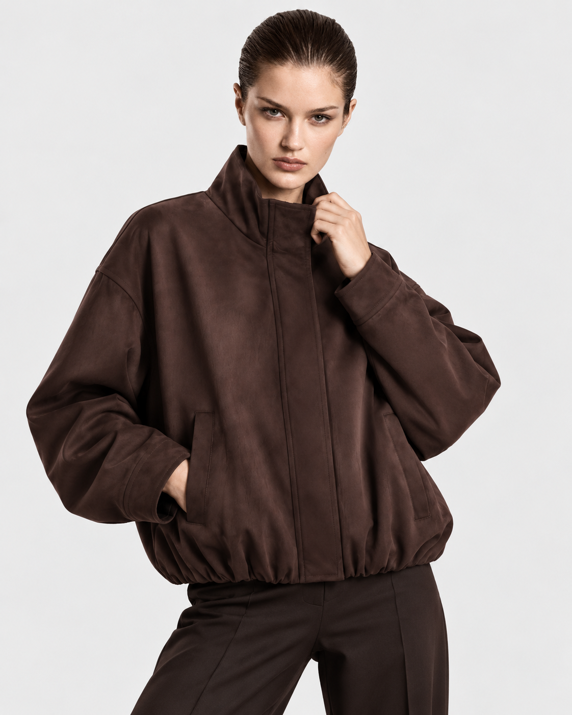 Image of Dark Brown | Model wearing dark brown zip-up flight bomber jacket, frontal studio pose