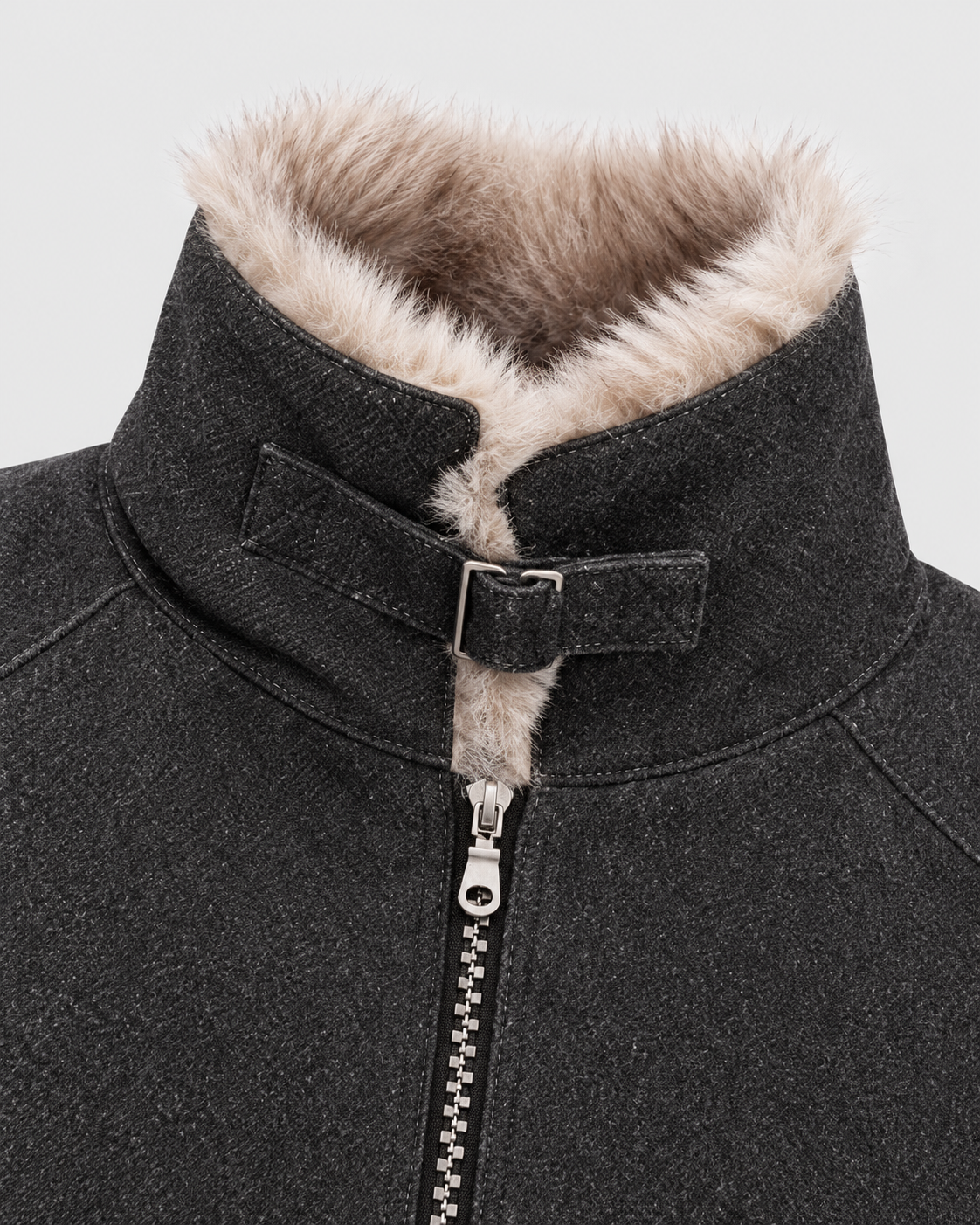 Image of Black | Close-up of the fur collar detail on the black zip-up jacket