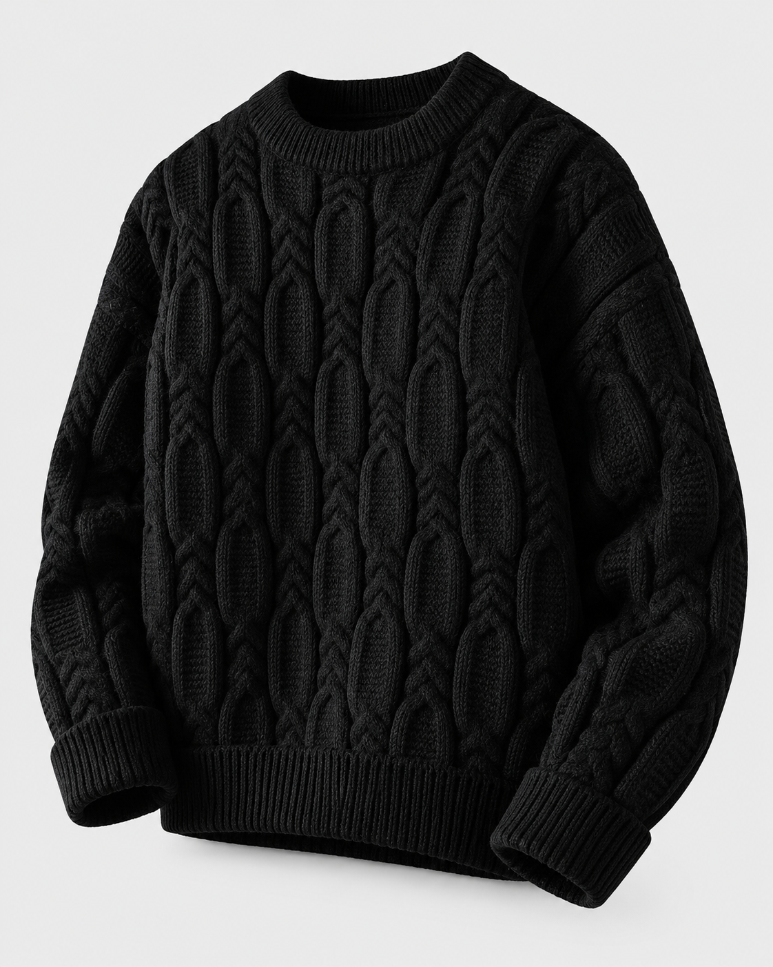 Image of Black | Black cable-knit sweater angled to show silhouette and sleeves