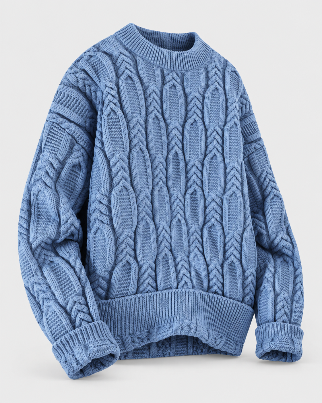 Image of Blue | Blue crewneck sweater photographed at an angle showing cable knit texture