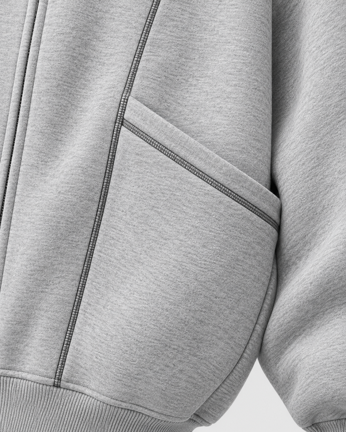 Image of Gray | Close-up of the gray hooded sweatshirt pocket and diagonal seams