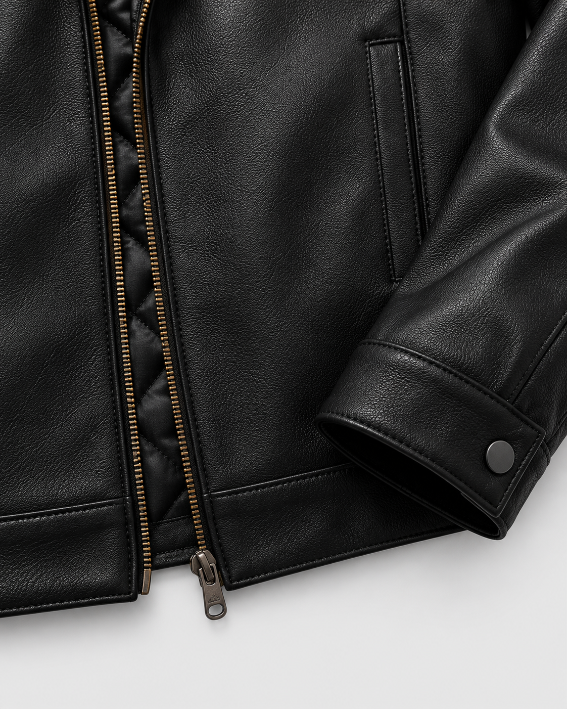 Black Padded | Sleeve cuff and zipper detailing of black padded jacket
