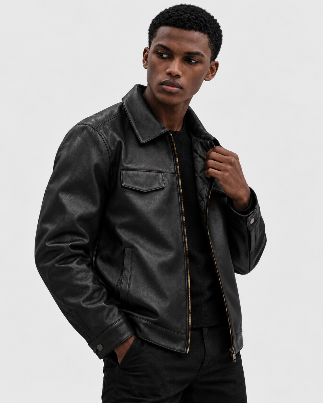 Image of Black Padded | Model styling men's black padded faux leather biker jacket in another pose