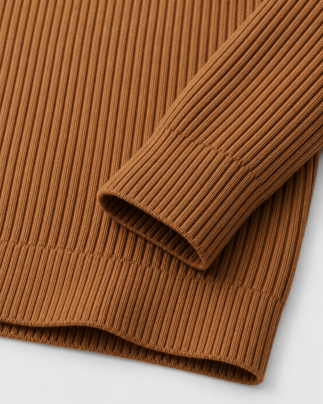 Caramel | Close-up of the sleeve cuff and ribbed hem