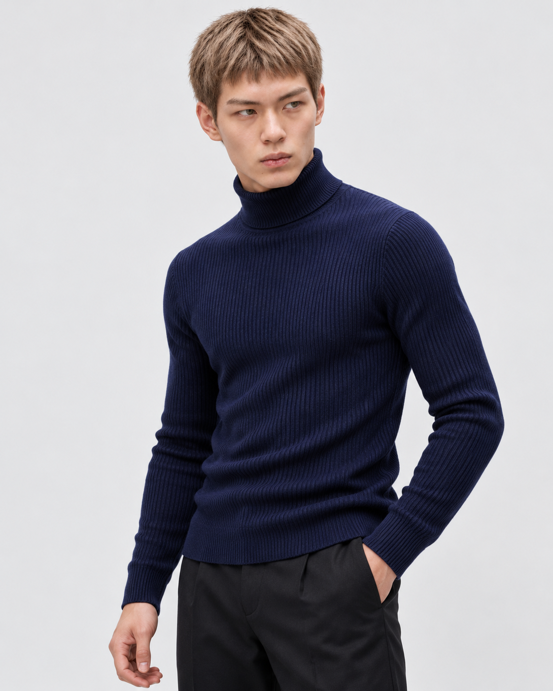 Navy | Male model wearing the ribbed turtleneck sweater in an alternate pose
