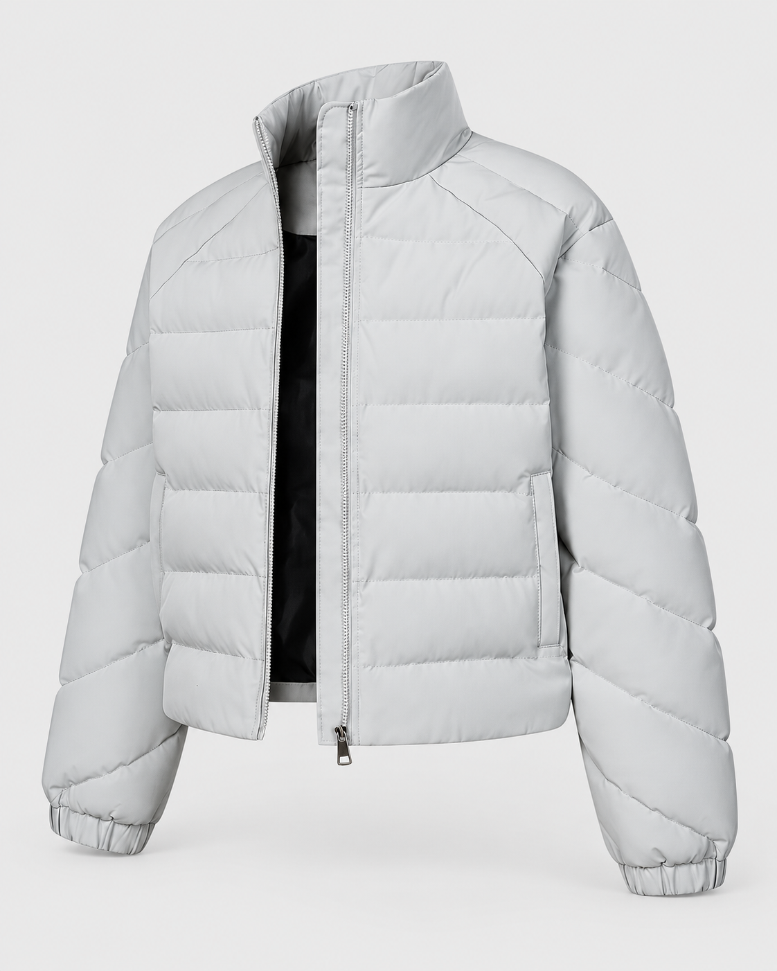 Gray | Front view of a unisex oversized quilted stand-collar puffer jacket against a light studio background