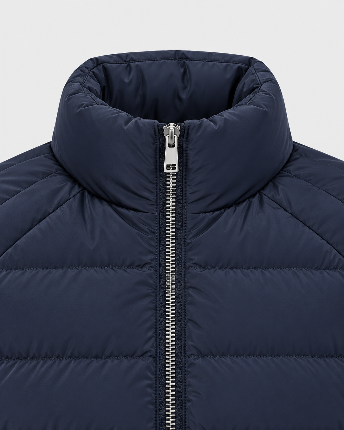 Image of Navy Blue | Close-up of the navy blue puffer jacket stand collar and center zipper