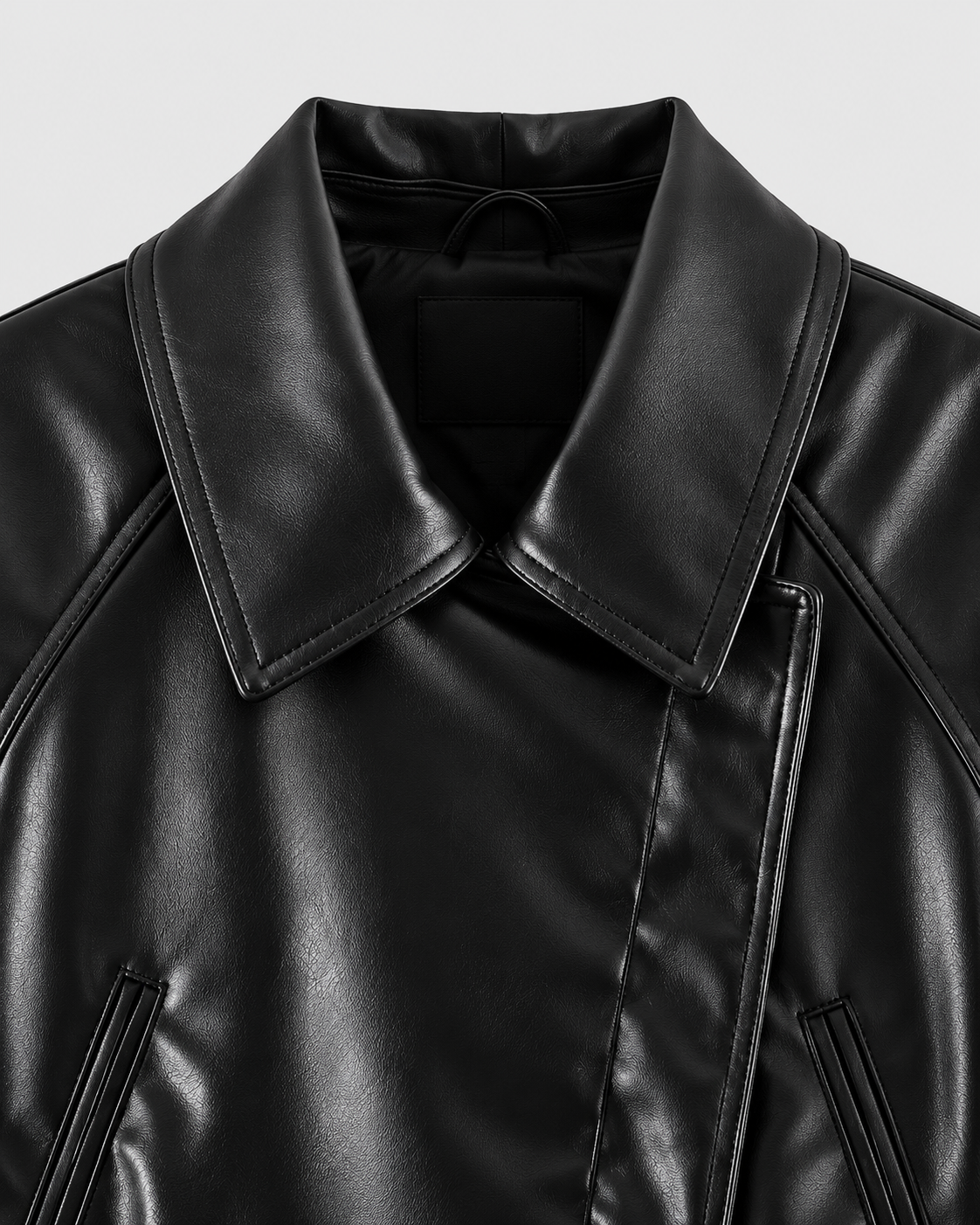 Image of Black | Close-up of biker-style collar and diagonal zip closure