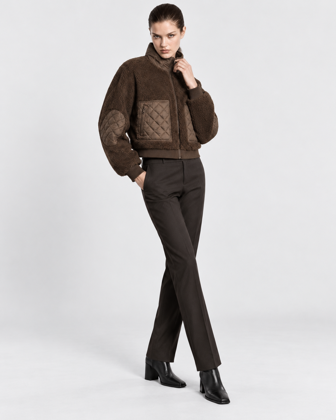Image of Brown | Model styling women's brown padded winter zip-up jacket, alternate pose