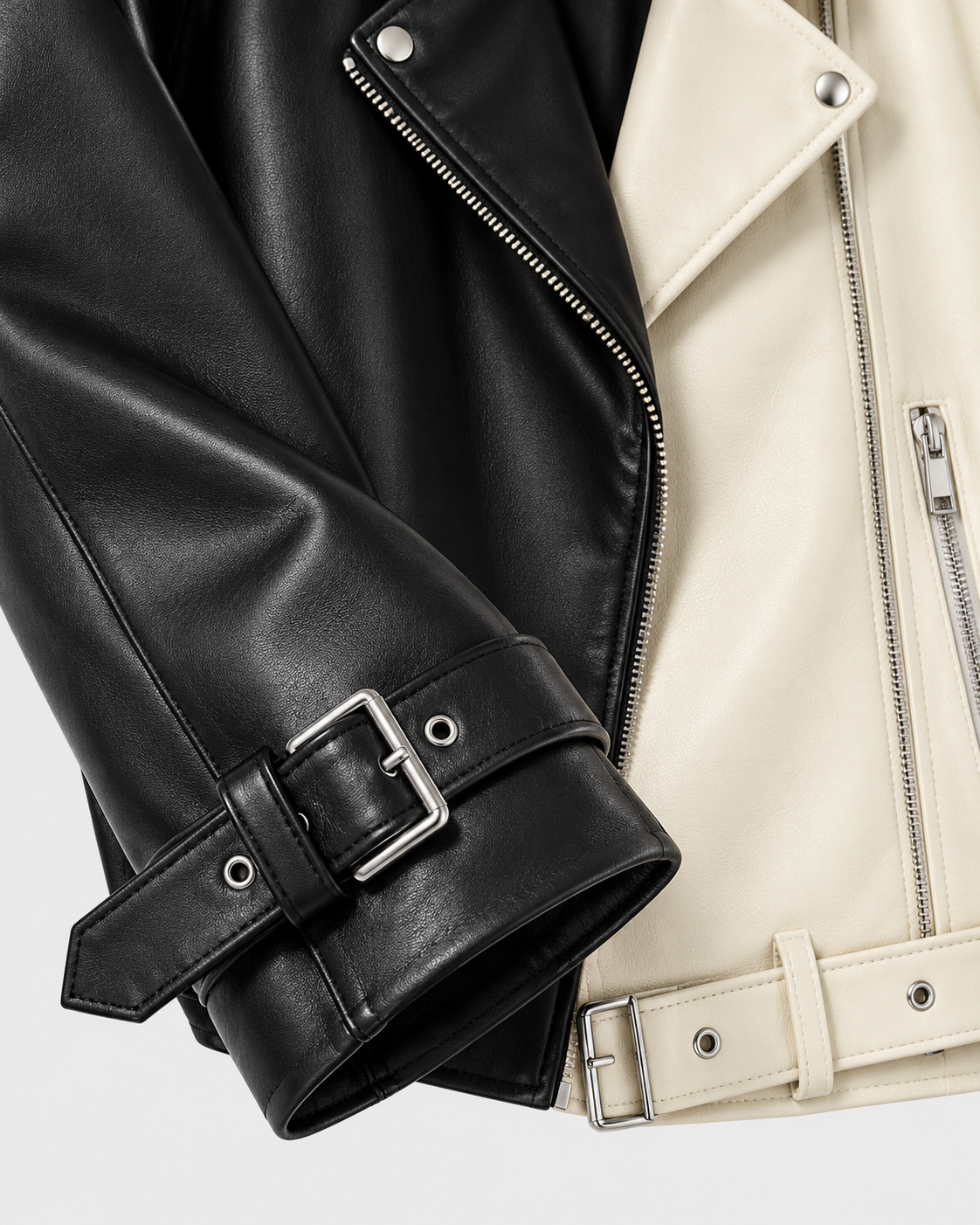 Beige | Close-up of belt buckle and cuff details on cropped biker jacket