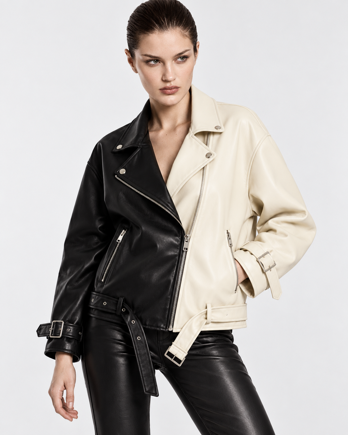 Image of Beige | Model styling two-tone cropped biker jacket, alternate studio pose