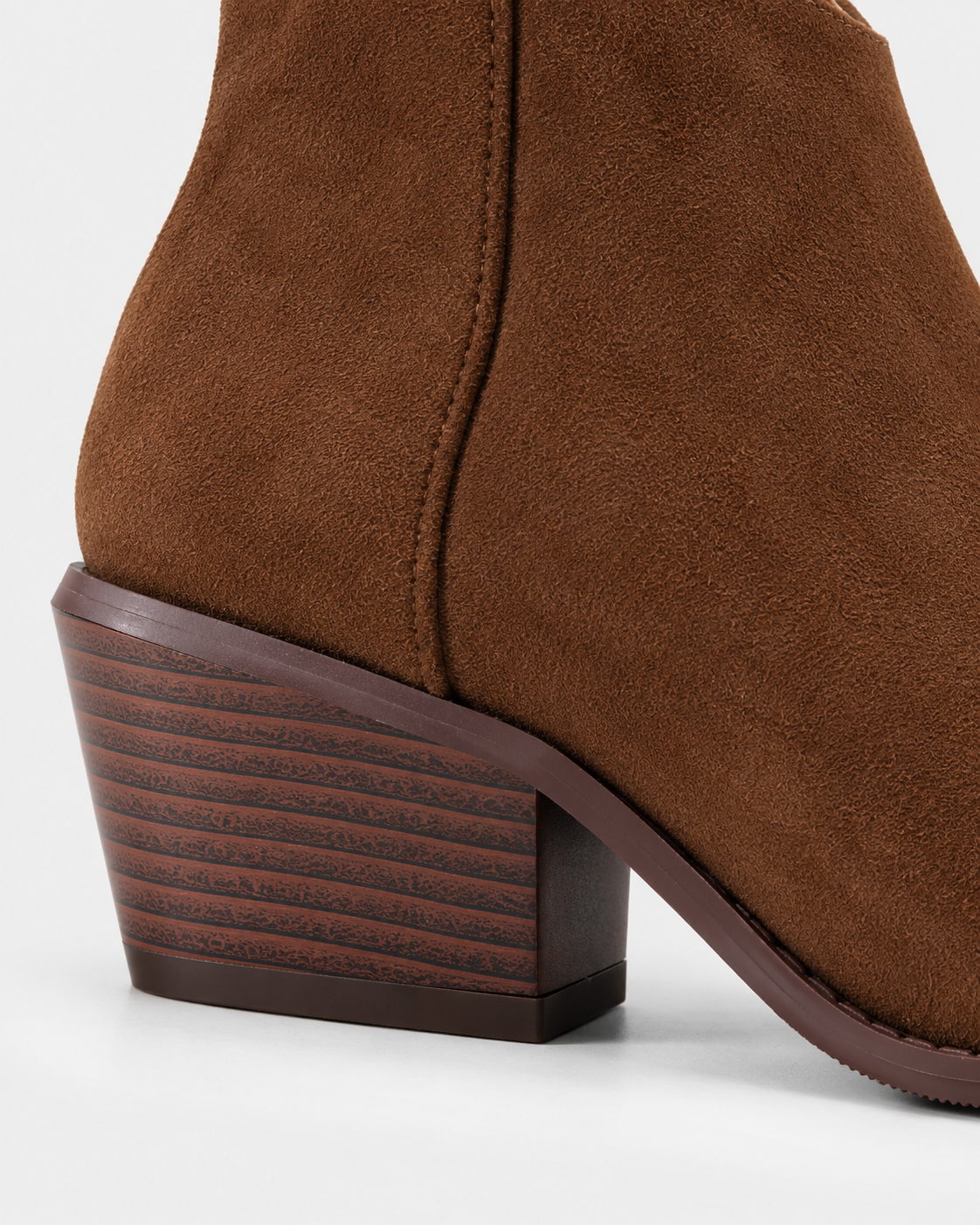 Image of Brown | Close-up of stacked-look block heel on brown pointed-toe ankle boot