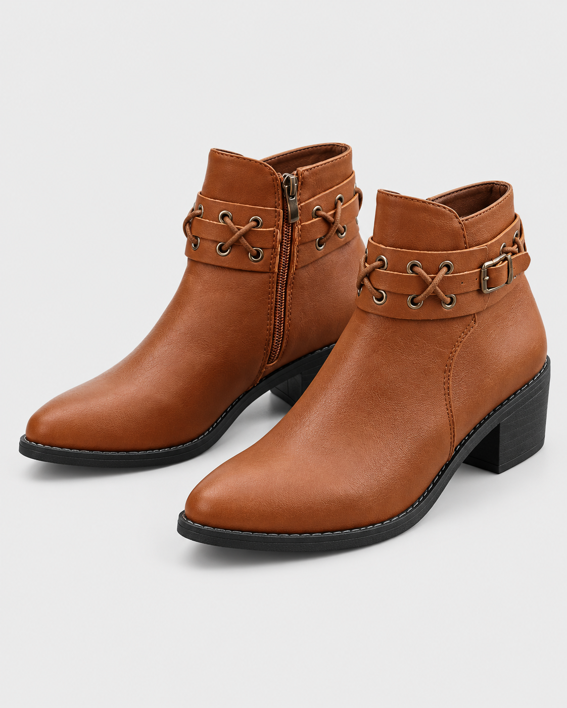Image of Light Brown | Pair of light brown faux leather ankle boots with rivet buckles, front view