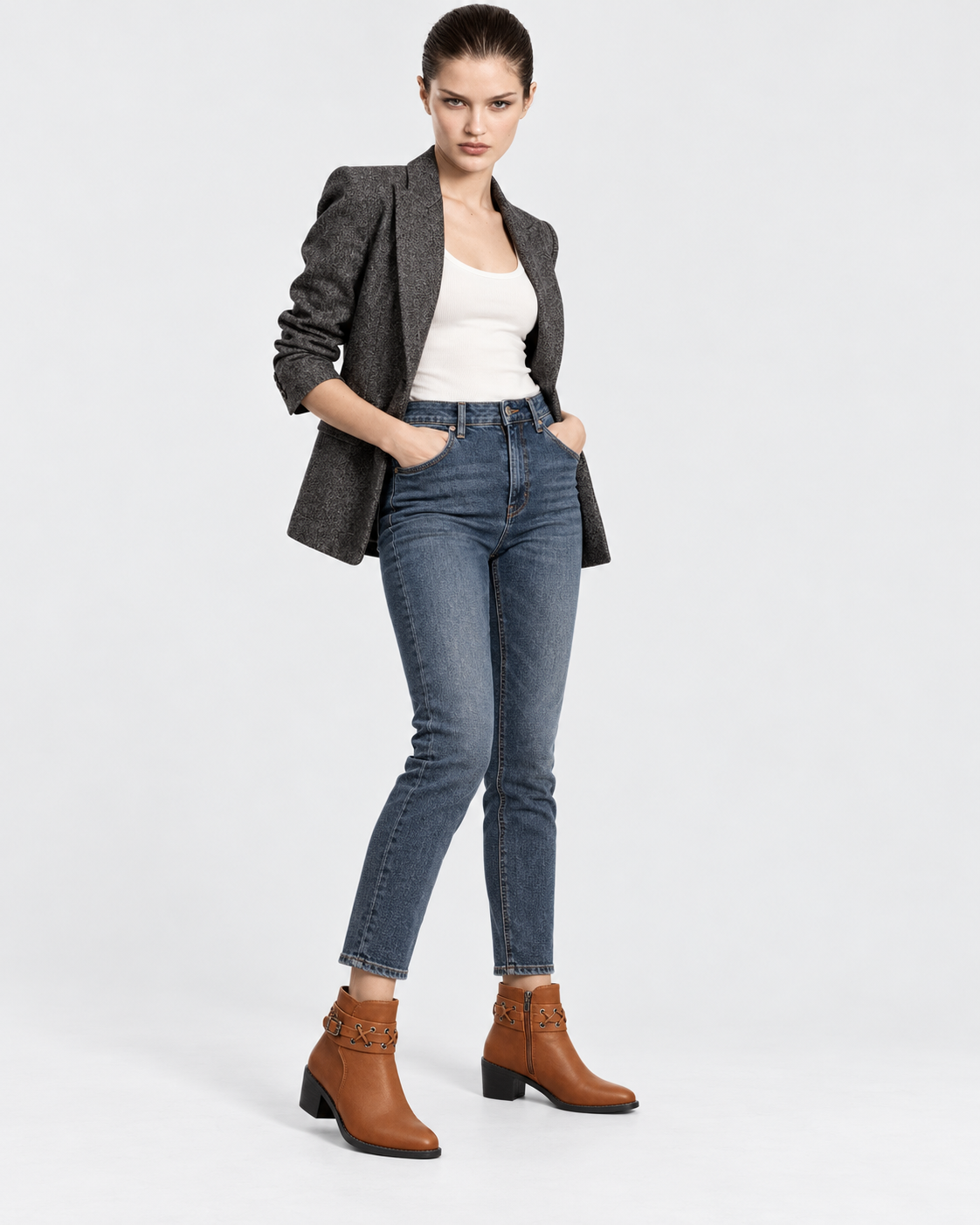 Image of Light Brown | Model wearing light brown rivet buckle ankle boots, full-length pose