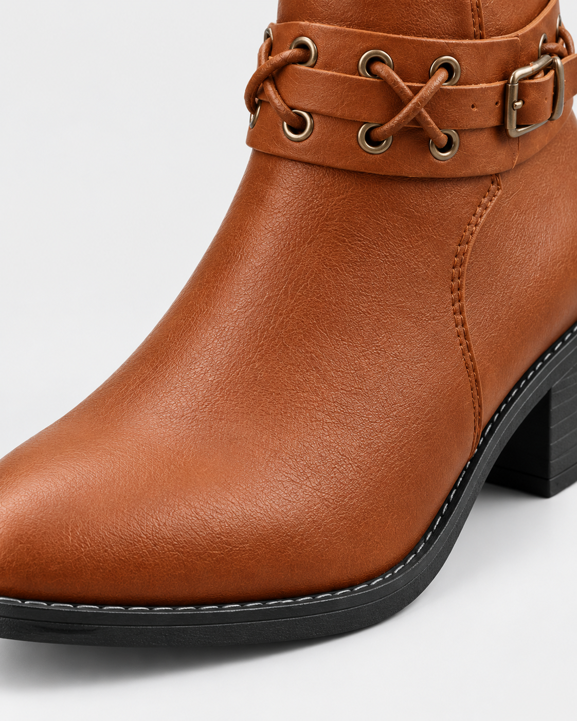 Light Brown | Close-up of pointed toe on light brown ankle boot