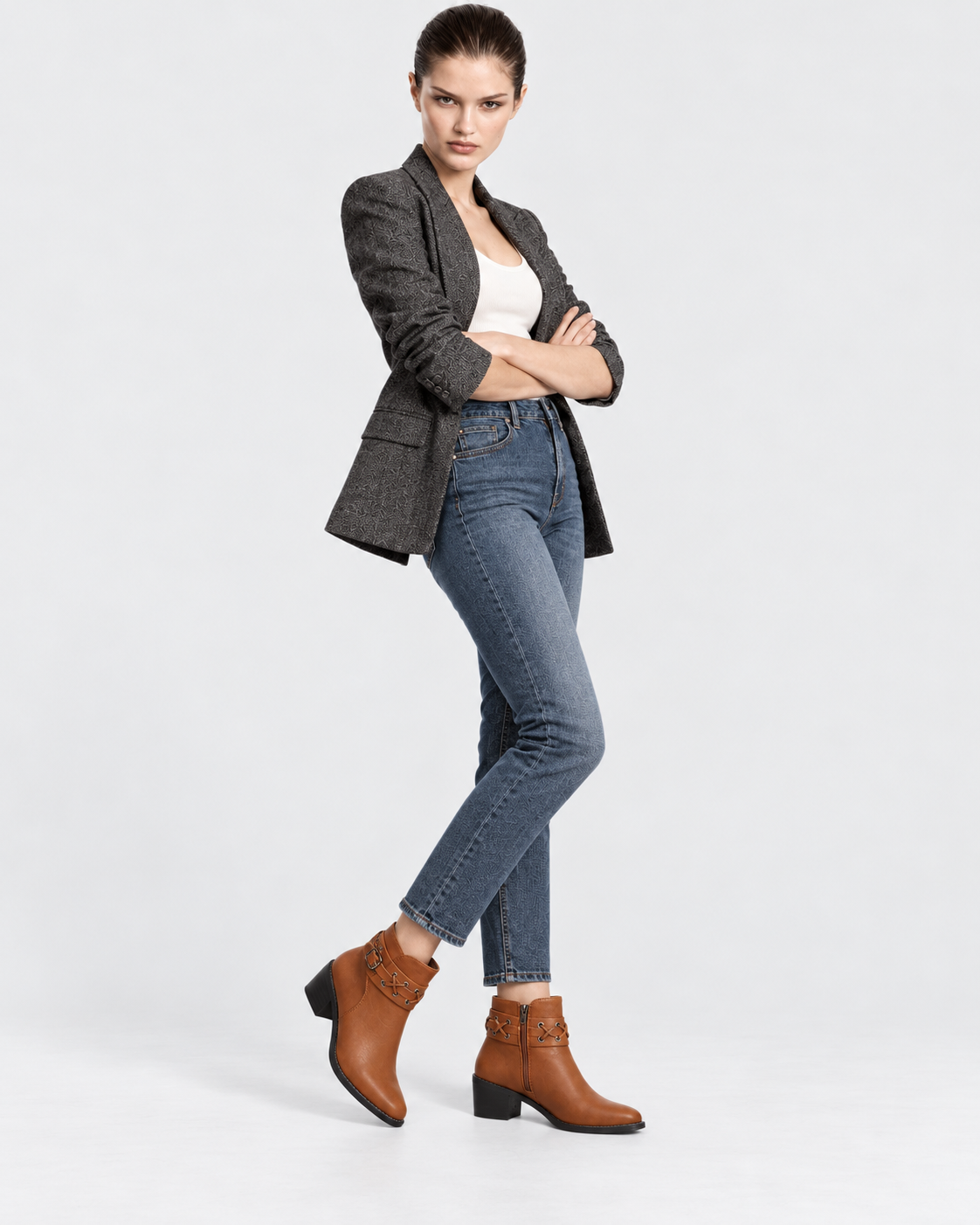 Light Brown | Model wearing light brown rivet buckle ankle boots in another pose