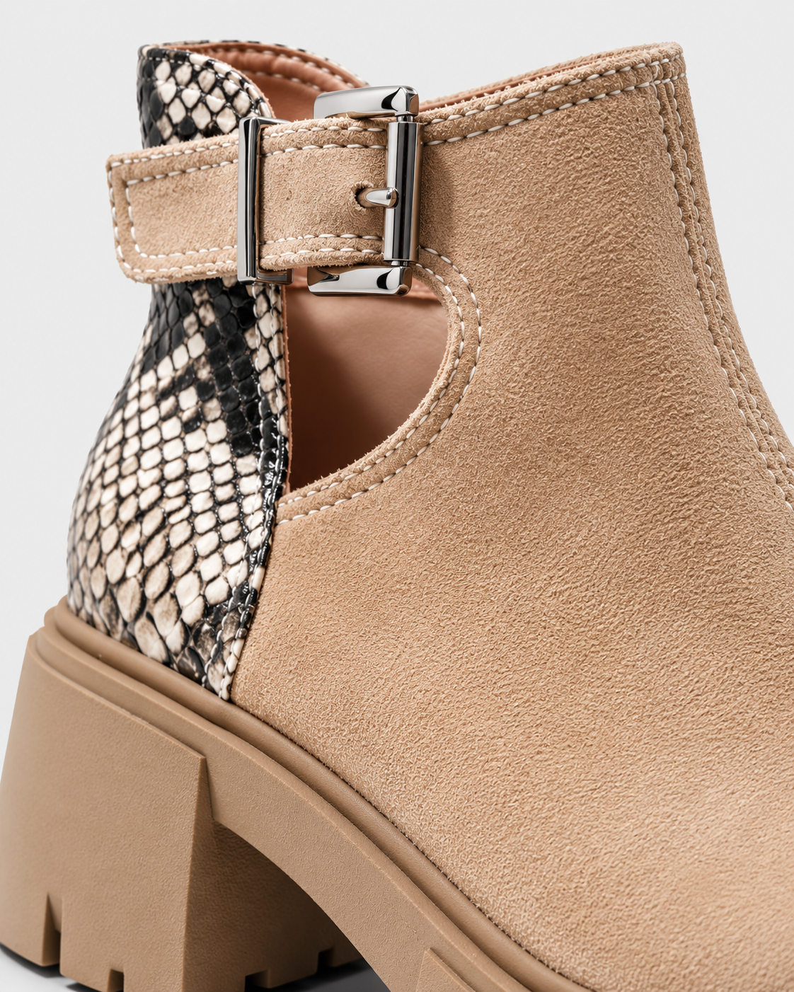 Image of Apricot | Close-up of ankle strap buckle and snakeskin-textured panel on boot