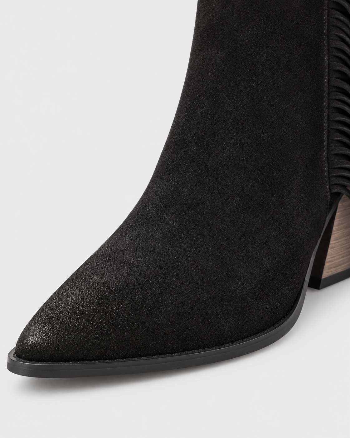 Image of Black | Close-up of pointed toe and suede-look upper on western ankle boot