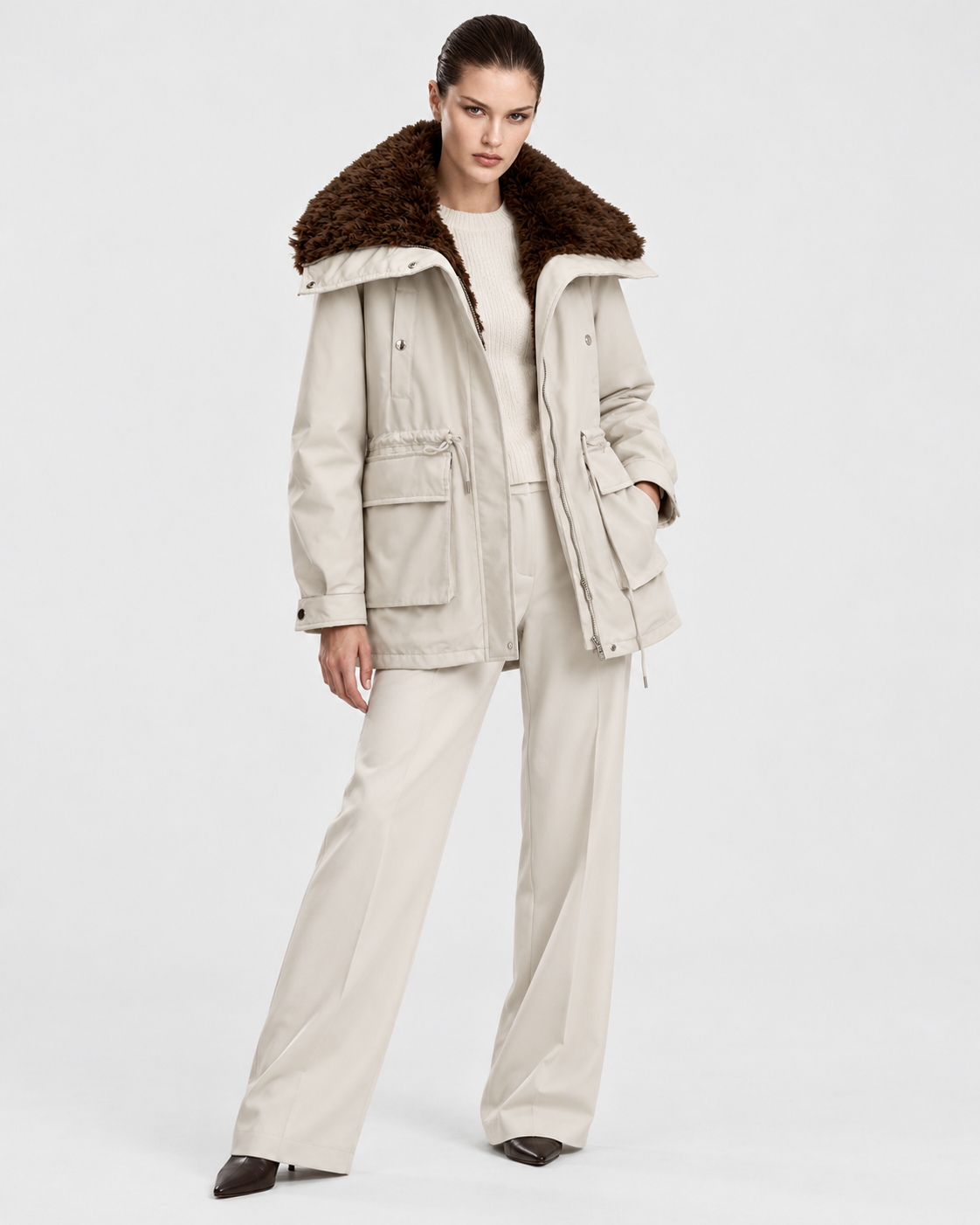 Apricot | Model wearing women's apricot cargo zip-up jacket, studio front view