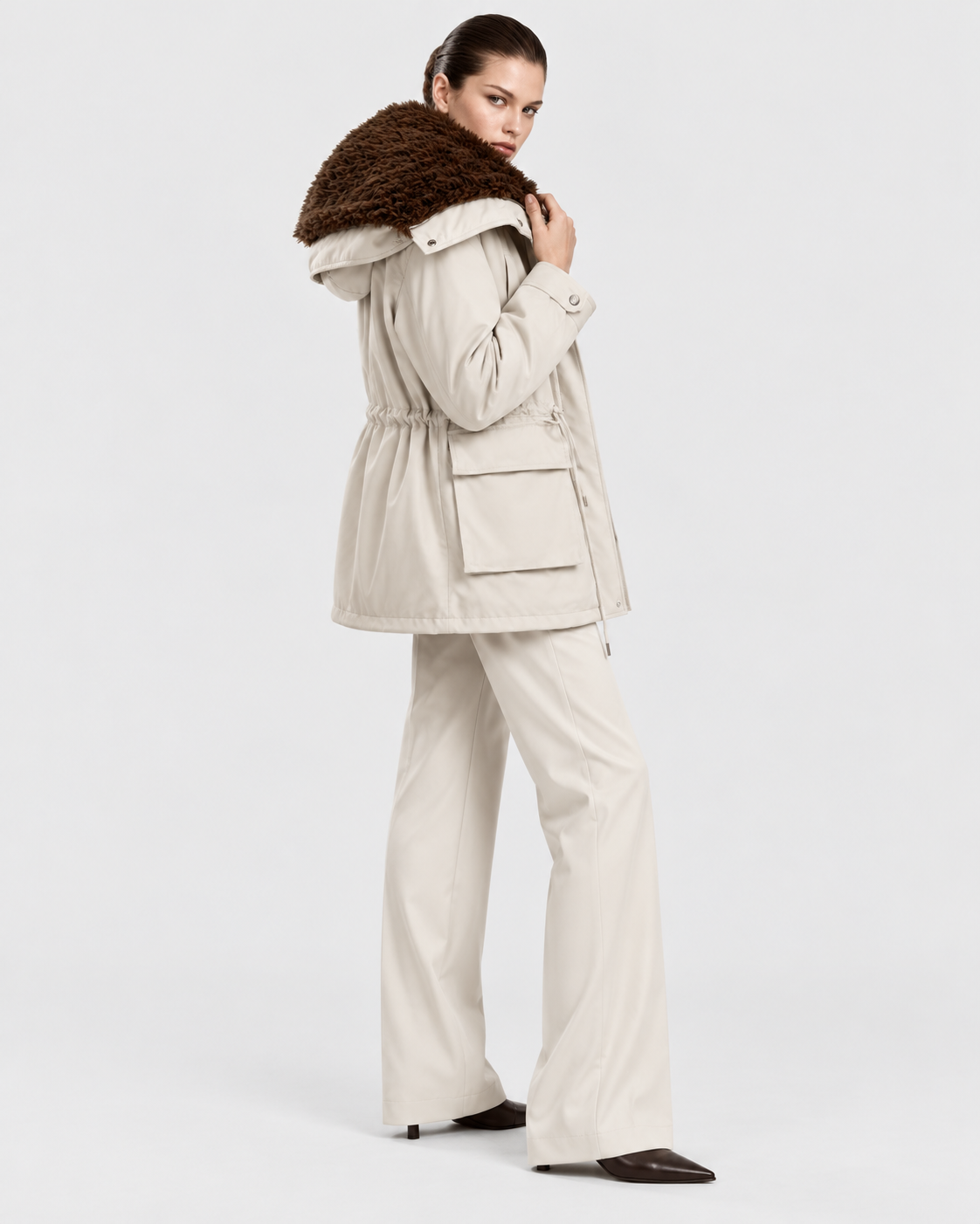 Apricot | Model styling women's apricot cargo zip-up jacket in alternate pose